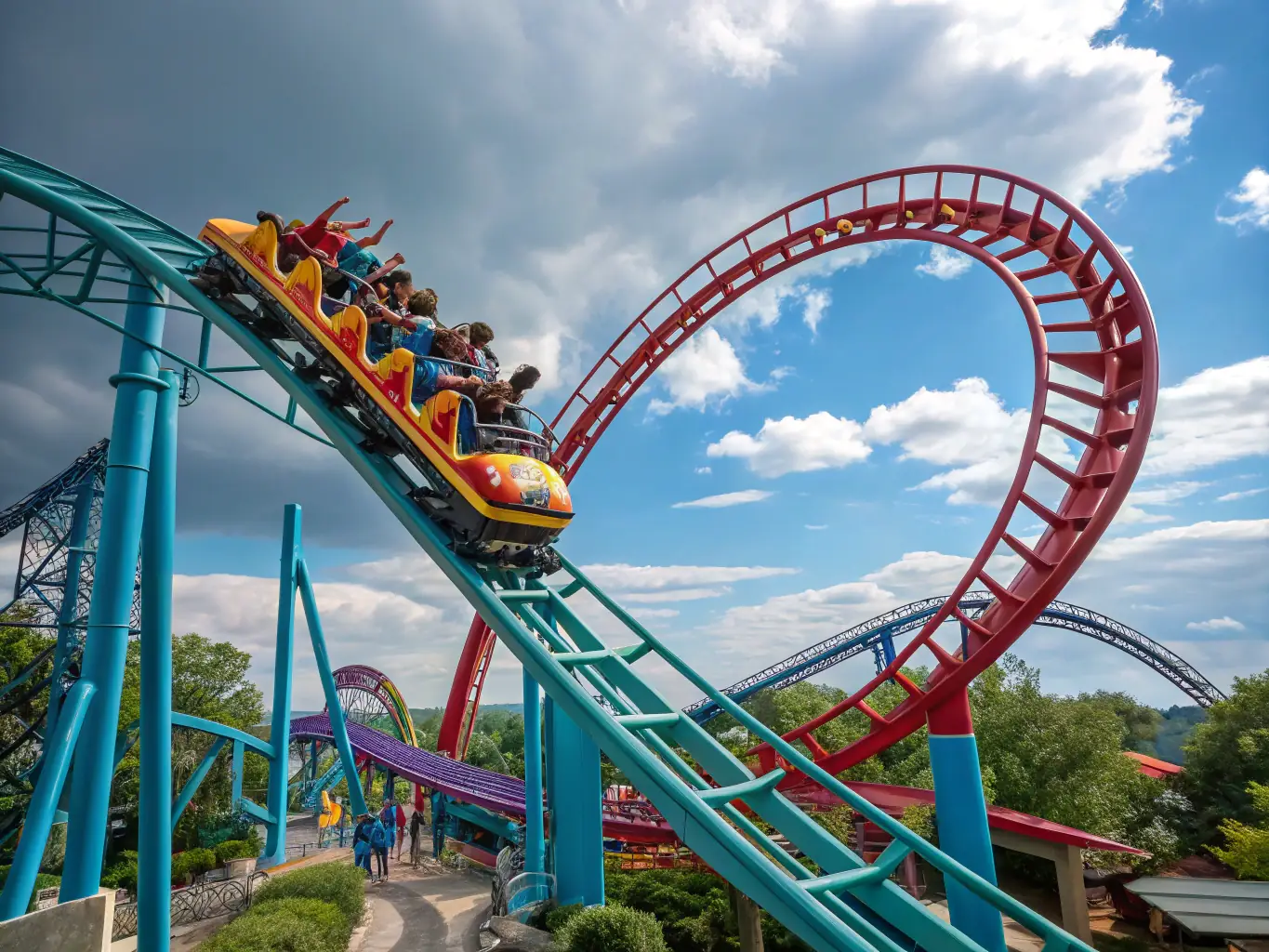 A high-angle, dynamic shot of the Hyperion roller coaster at Energylandia, showcasing its immense height and steep drop, with riders visible in the cars, expressing excitement and thrill.